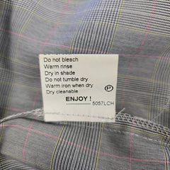 Fabric with a care label on a checkered background