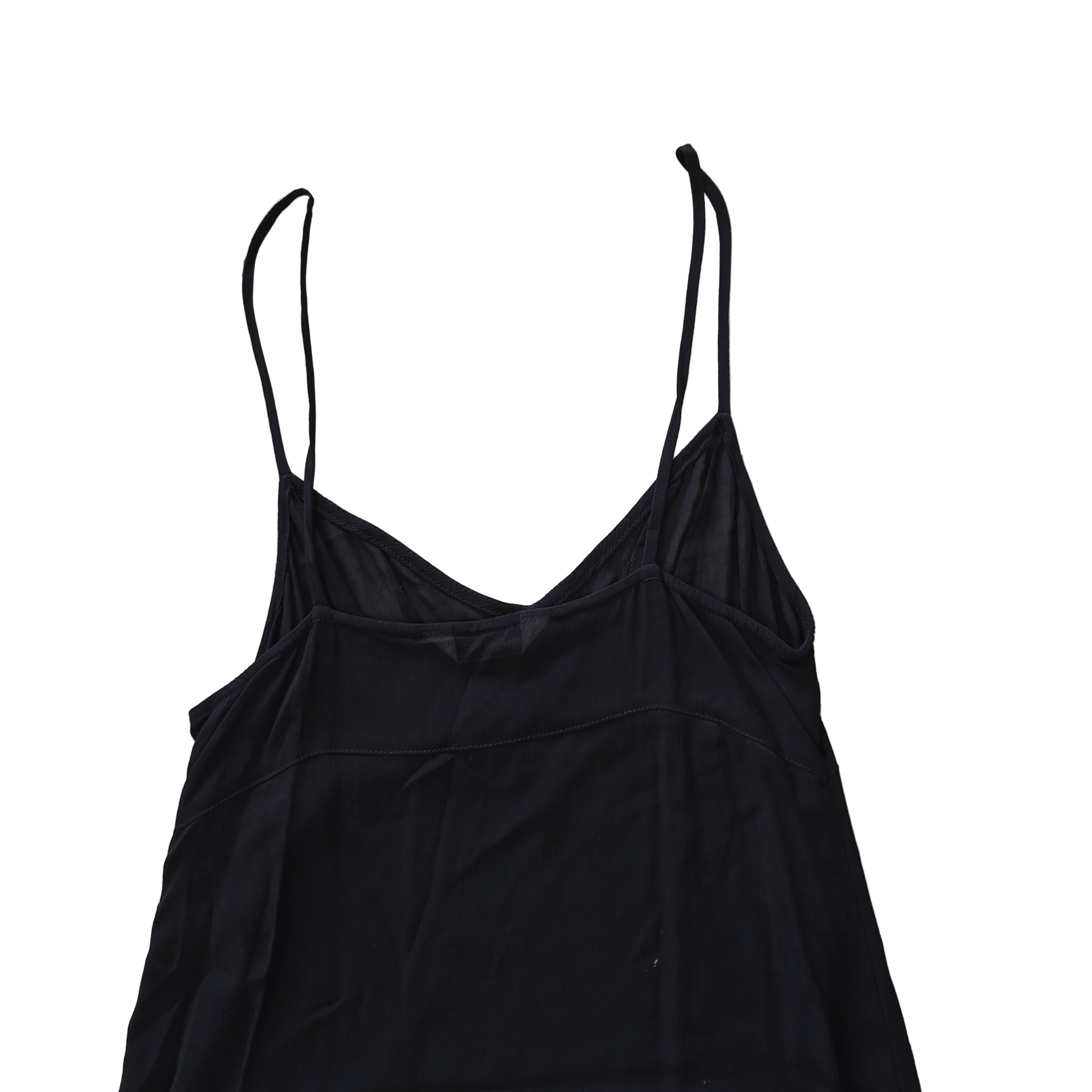 Black dress with beige lining on a light background