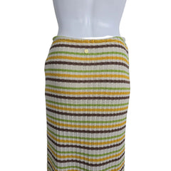 Mannequin with a skirt on a plain background