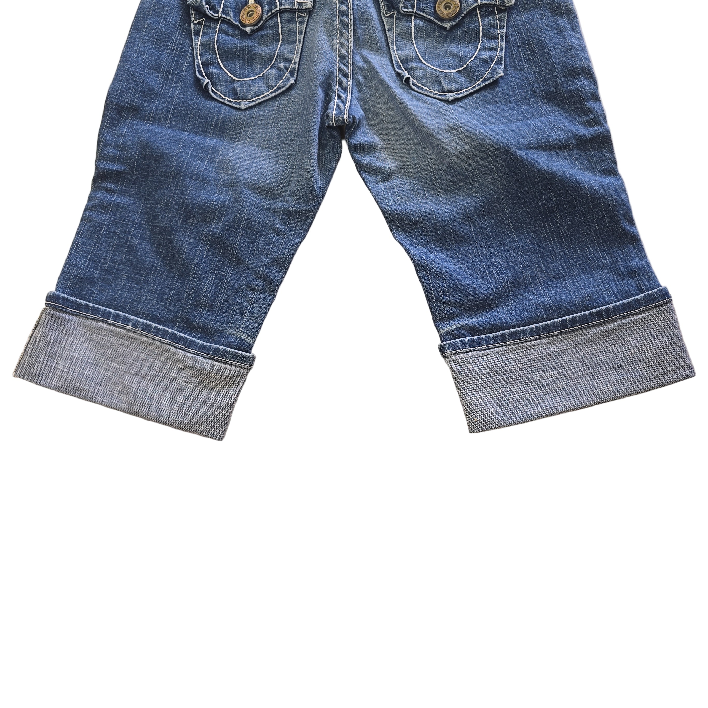 Pair of blue jean shorts on a light background