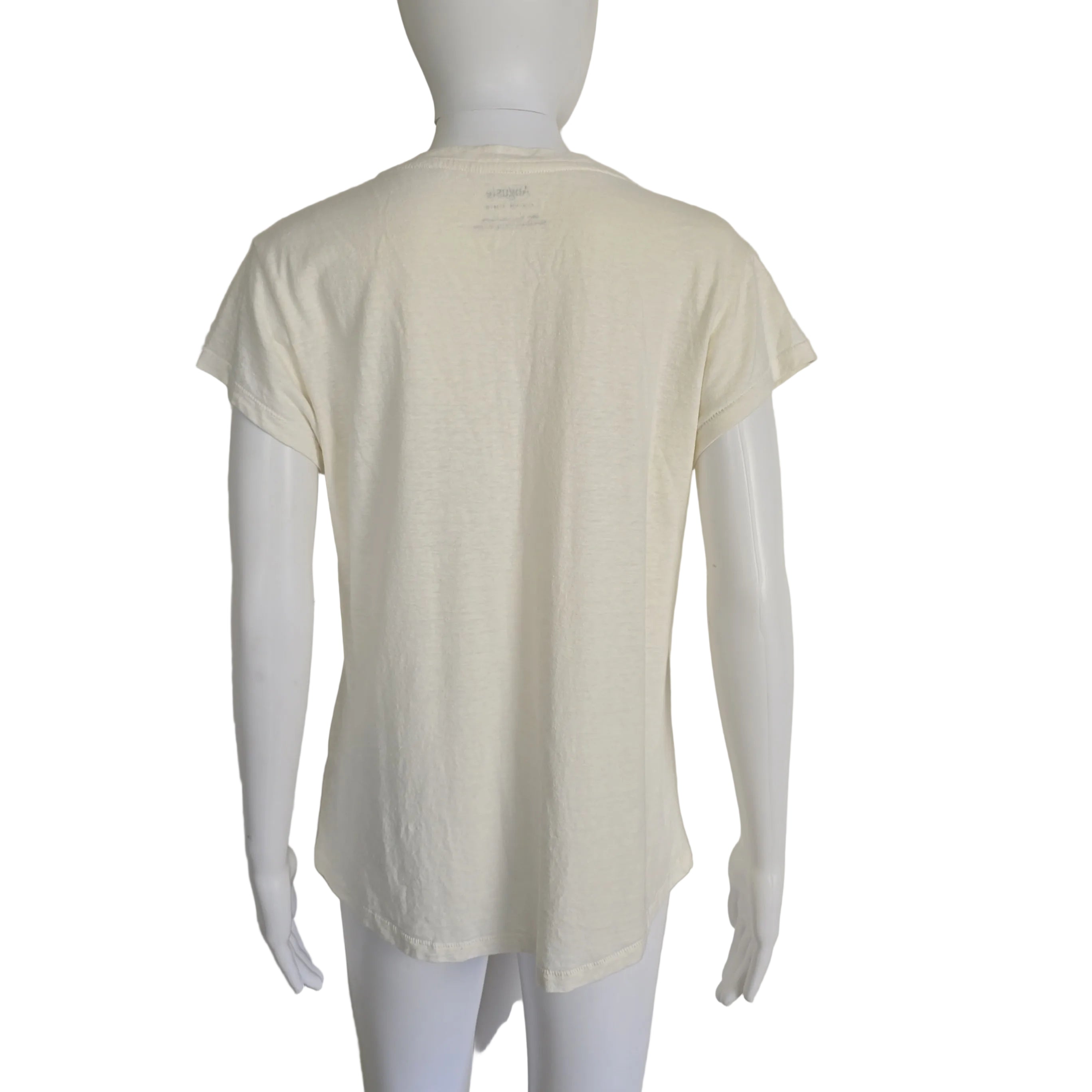 Mannequin wearing a light-colored top on a plain background