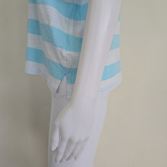 Light blue and white striped shirt on a light background