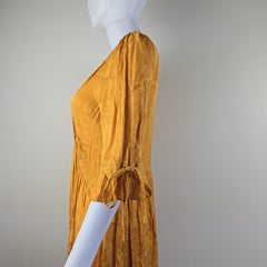 Yellow dress on a light background