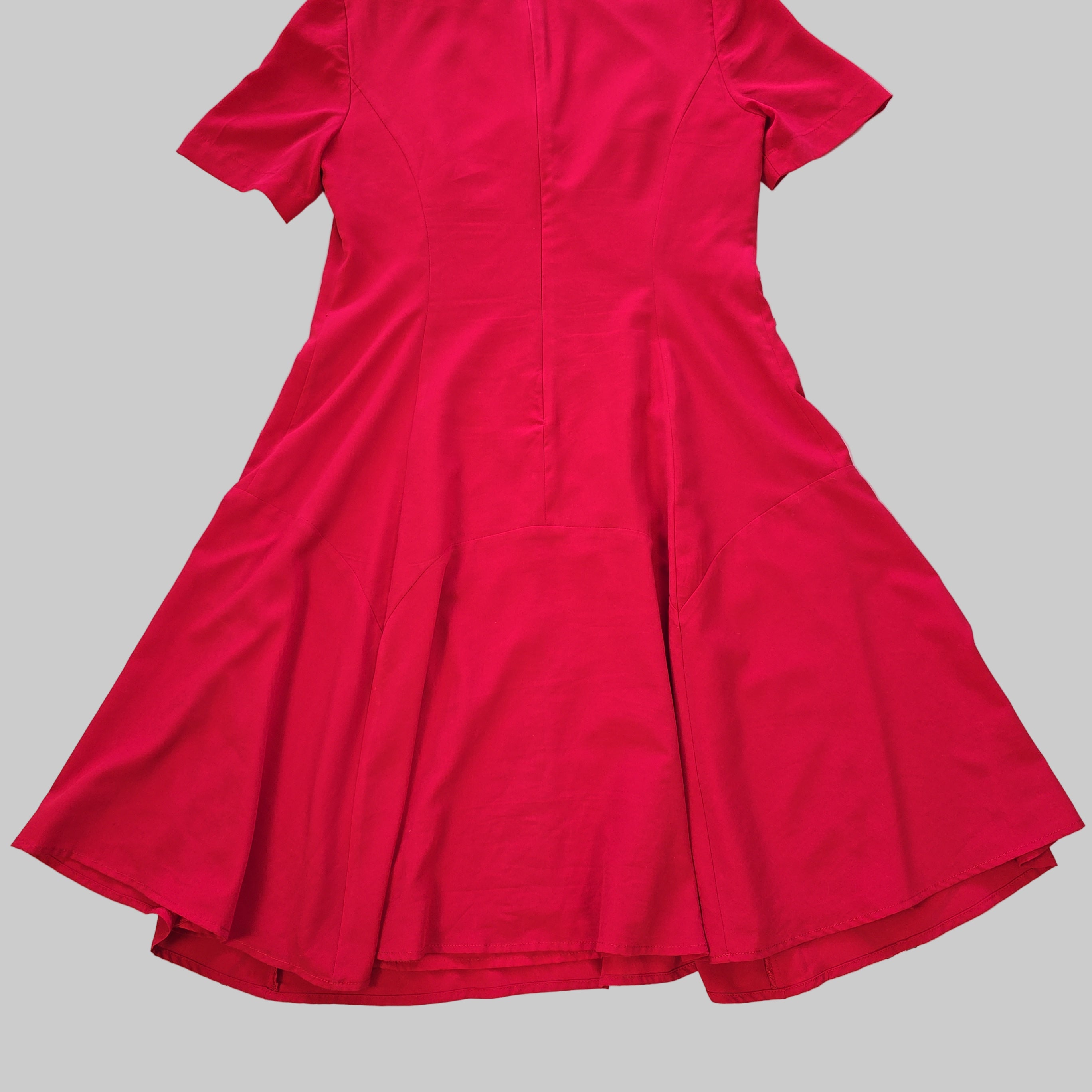 Red dress on a tiled floor