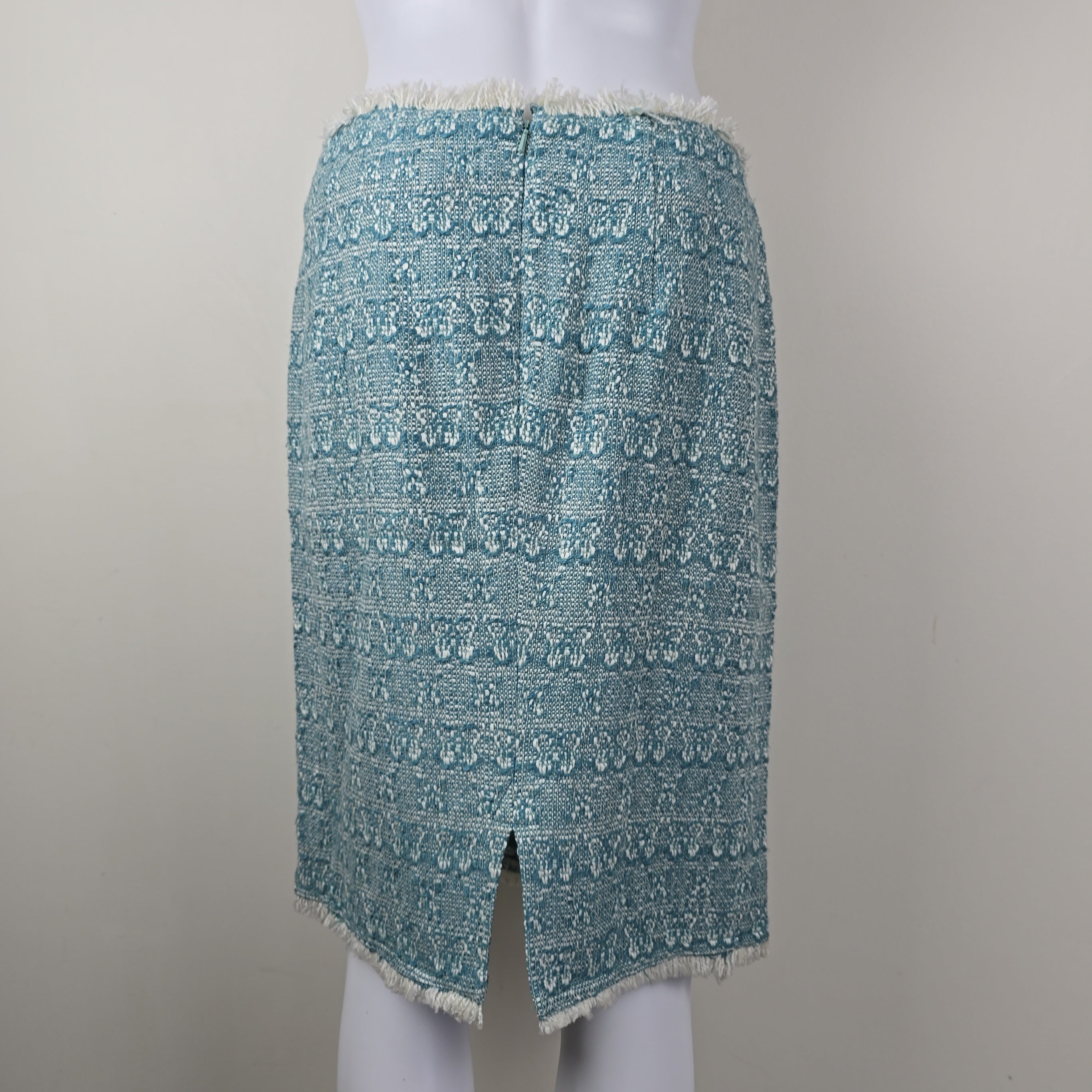 Textured blue fabric skirt on a white background