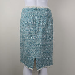 Textured blue fabric skirt on a white background