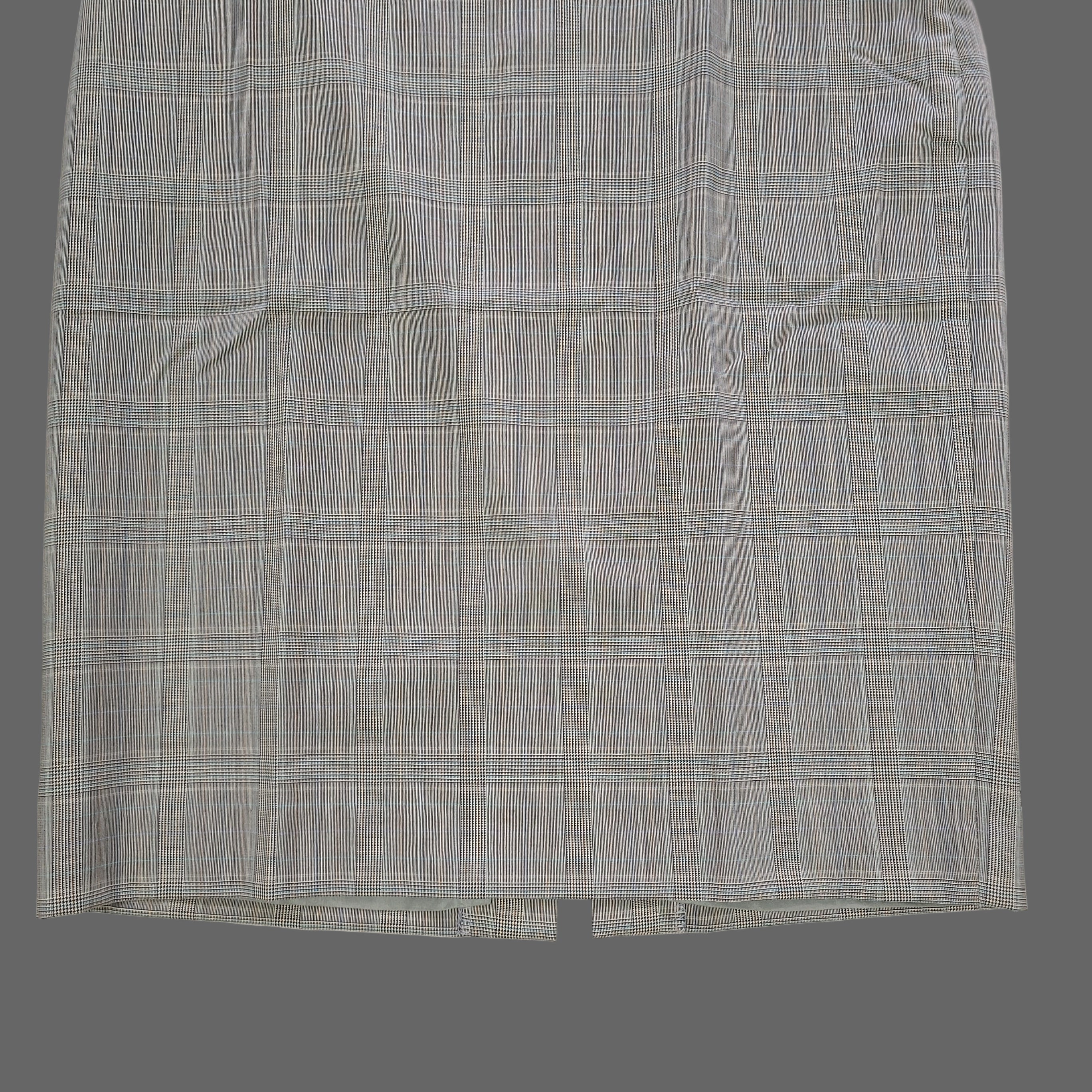 Plaid skirt on a tiled floor