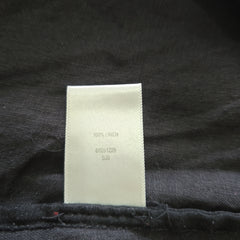 Label on a dark fabric background