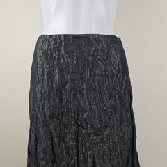 Black textured fabric on a white background