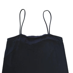 Black mini dress on a light background