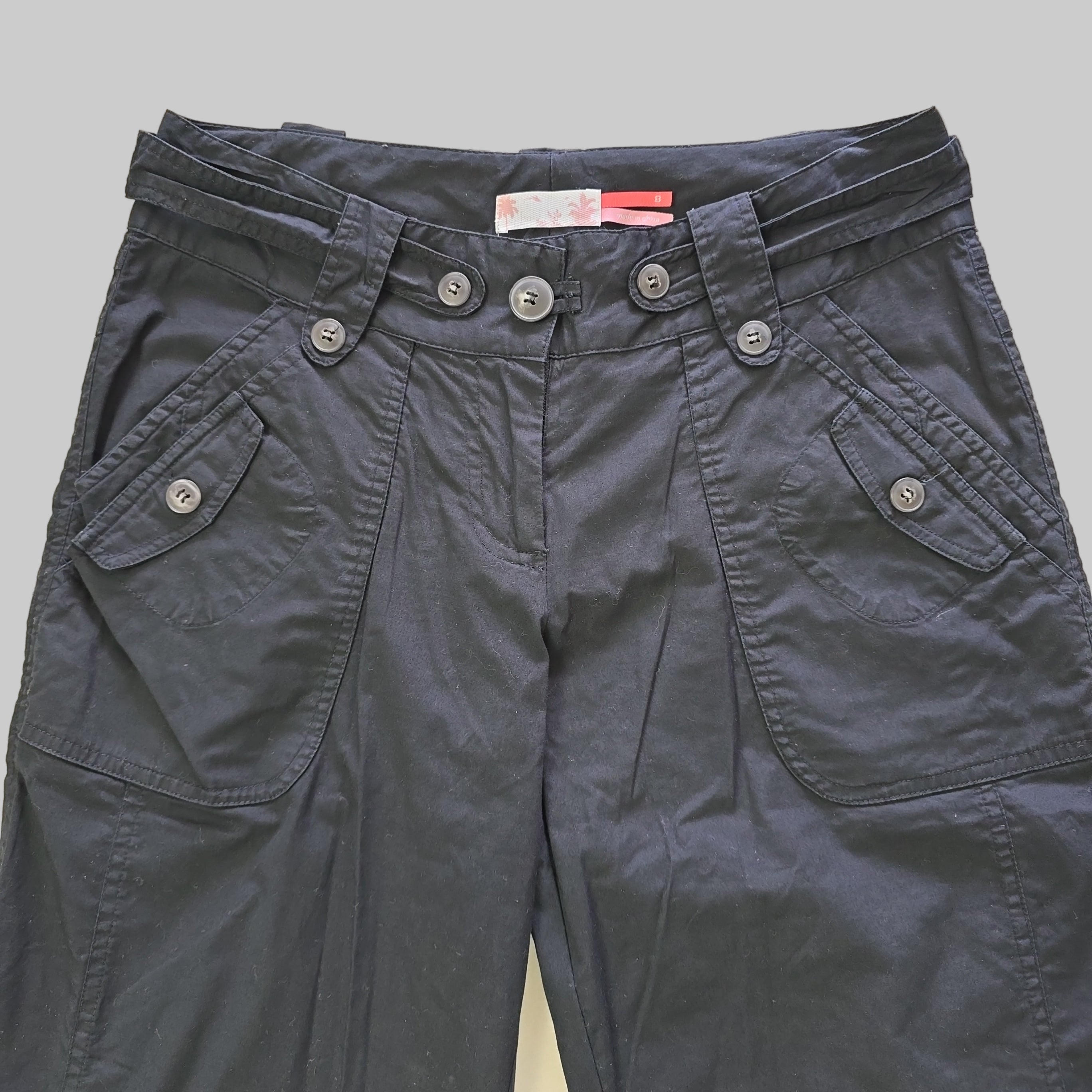 Pair of black pants on a light background