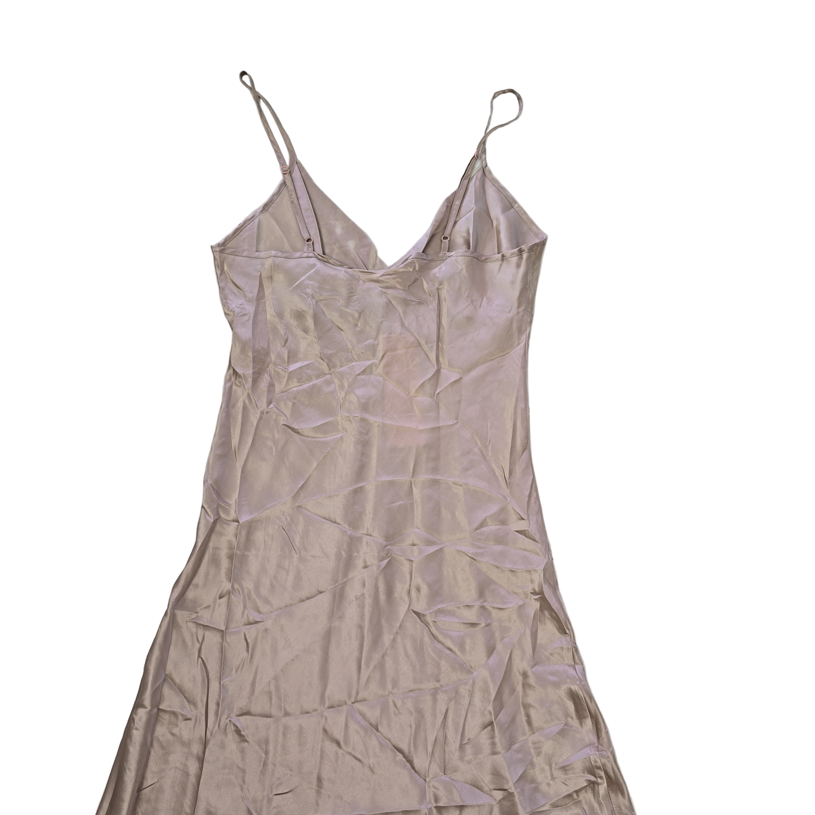 Light pink/beige silk slip dress on a light background