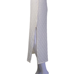 White textured dress on a light background.