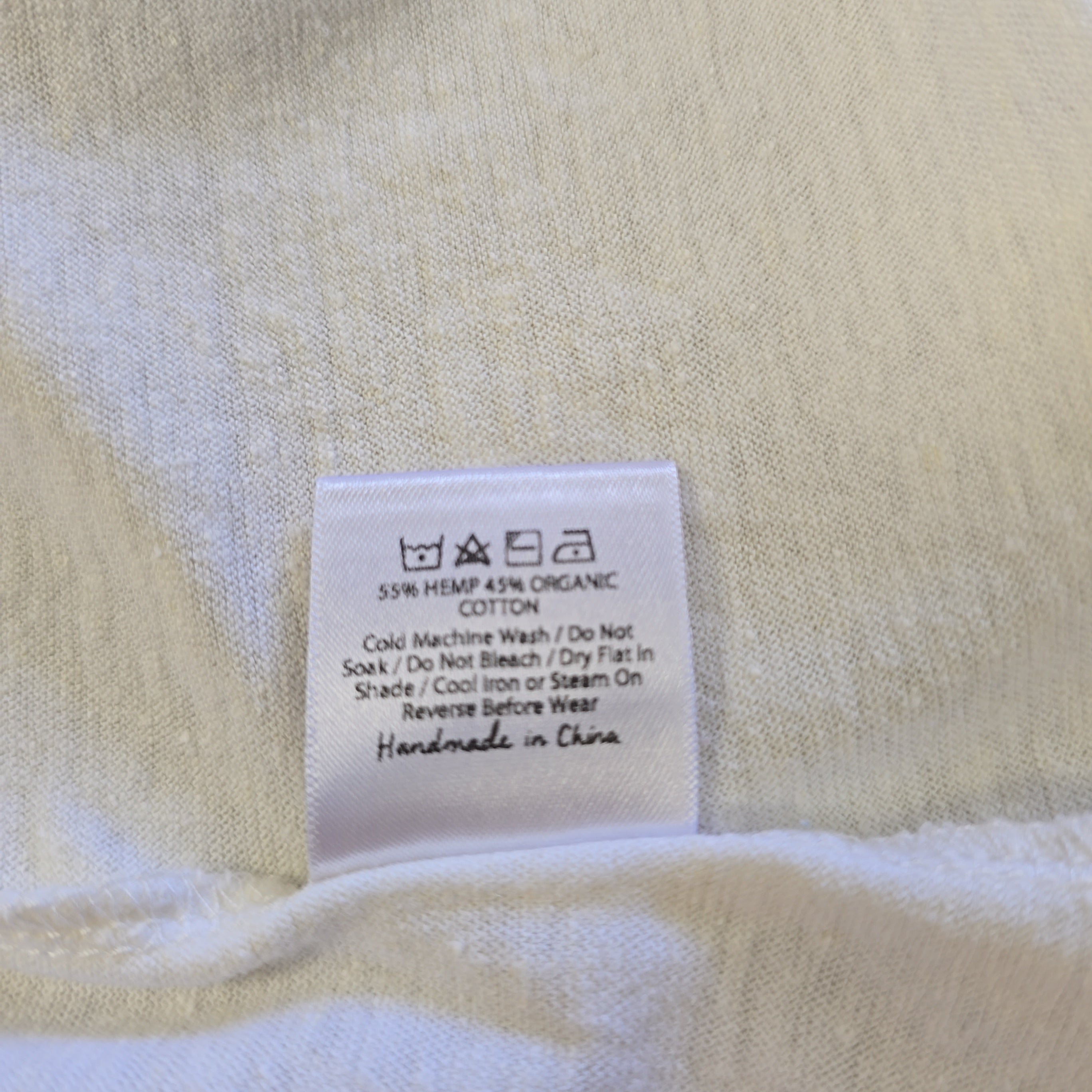 Close-up of a label on a textured fabric background