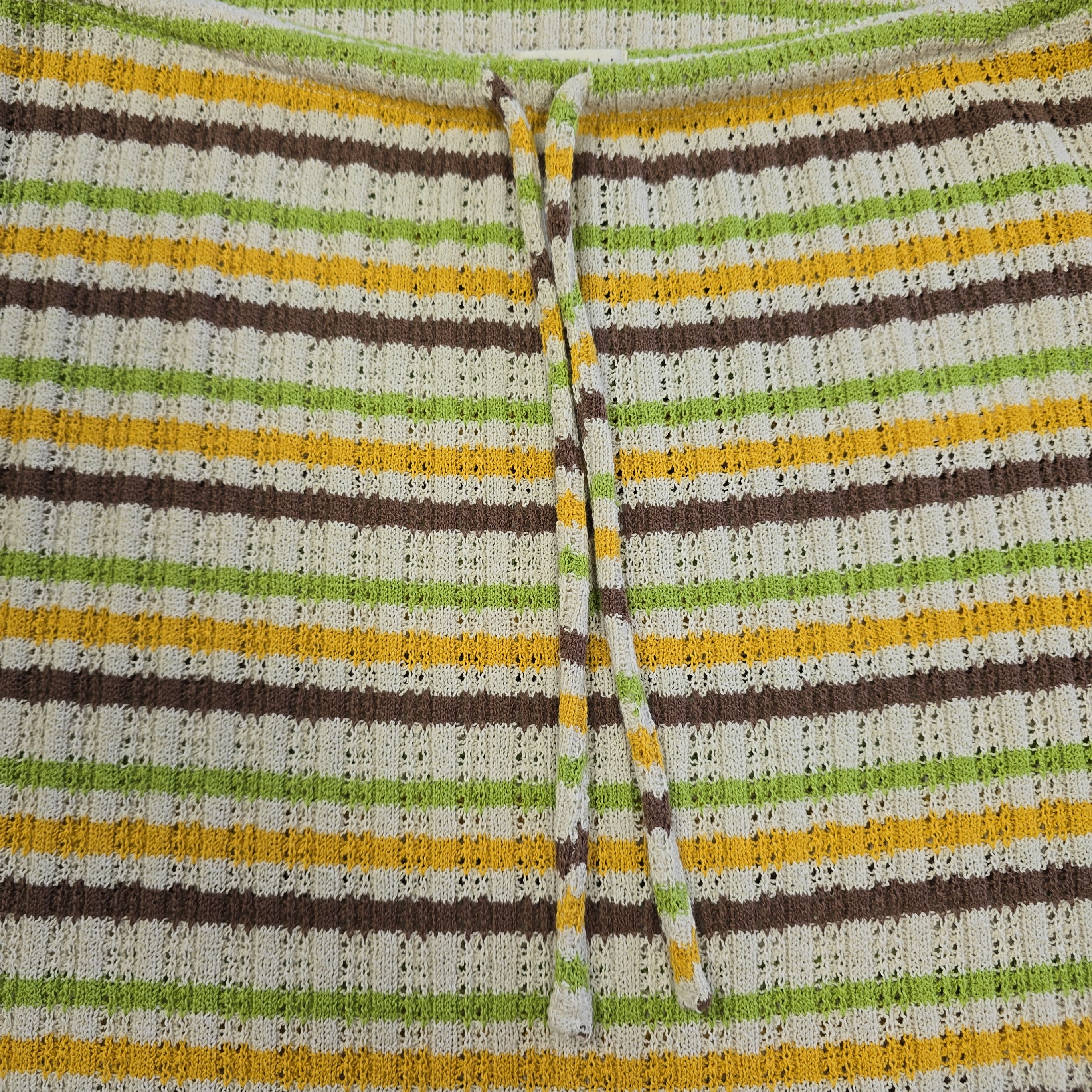 Striped fabric with brown, green, and yellow colors