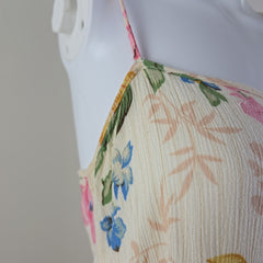Close-up of a floral-patterned fabric with a white background