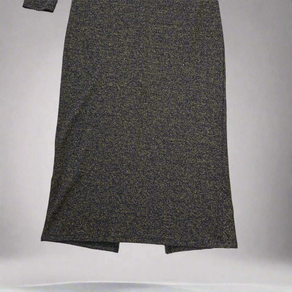 Black and gold textured dress against a light gray background