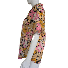 Floral-patterned shirt on a light background