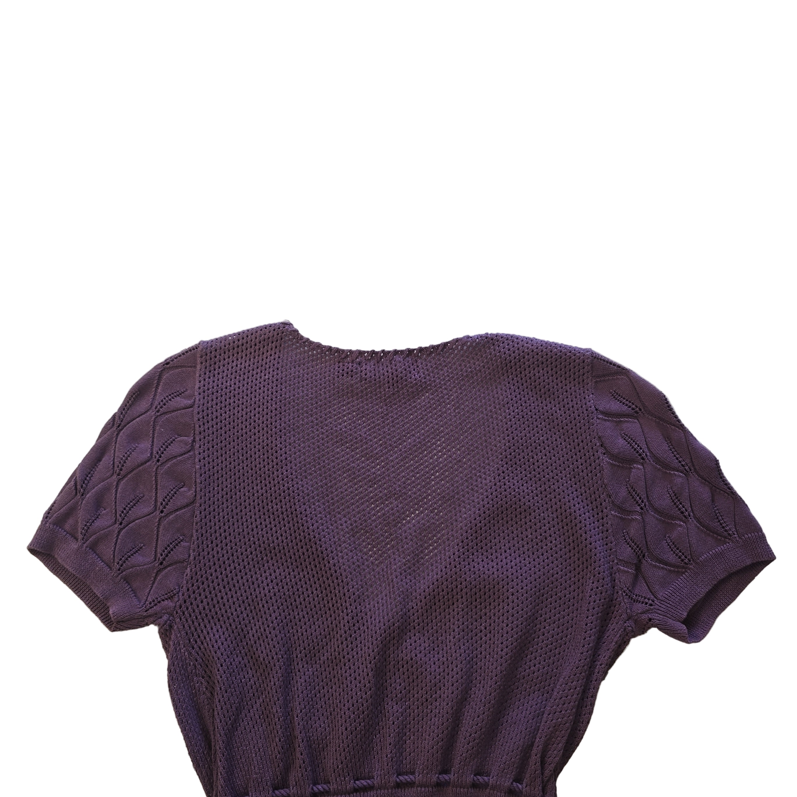 Purple textured top on a tiled floor