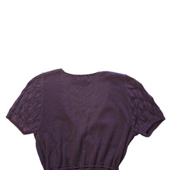 Purple textured top on a tiled floor