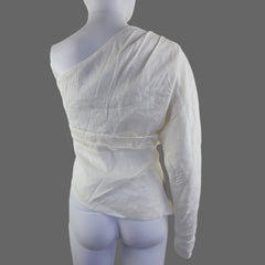 White top on a mannequin arm against a plain background