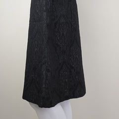 Black textured skirt on a white background