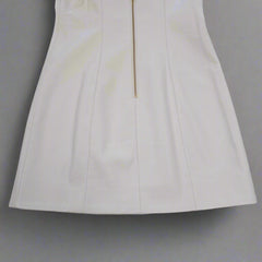 White dress on a tiled floor