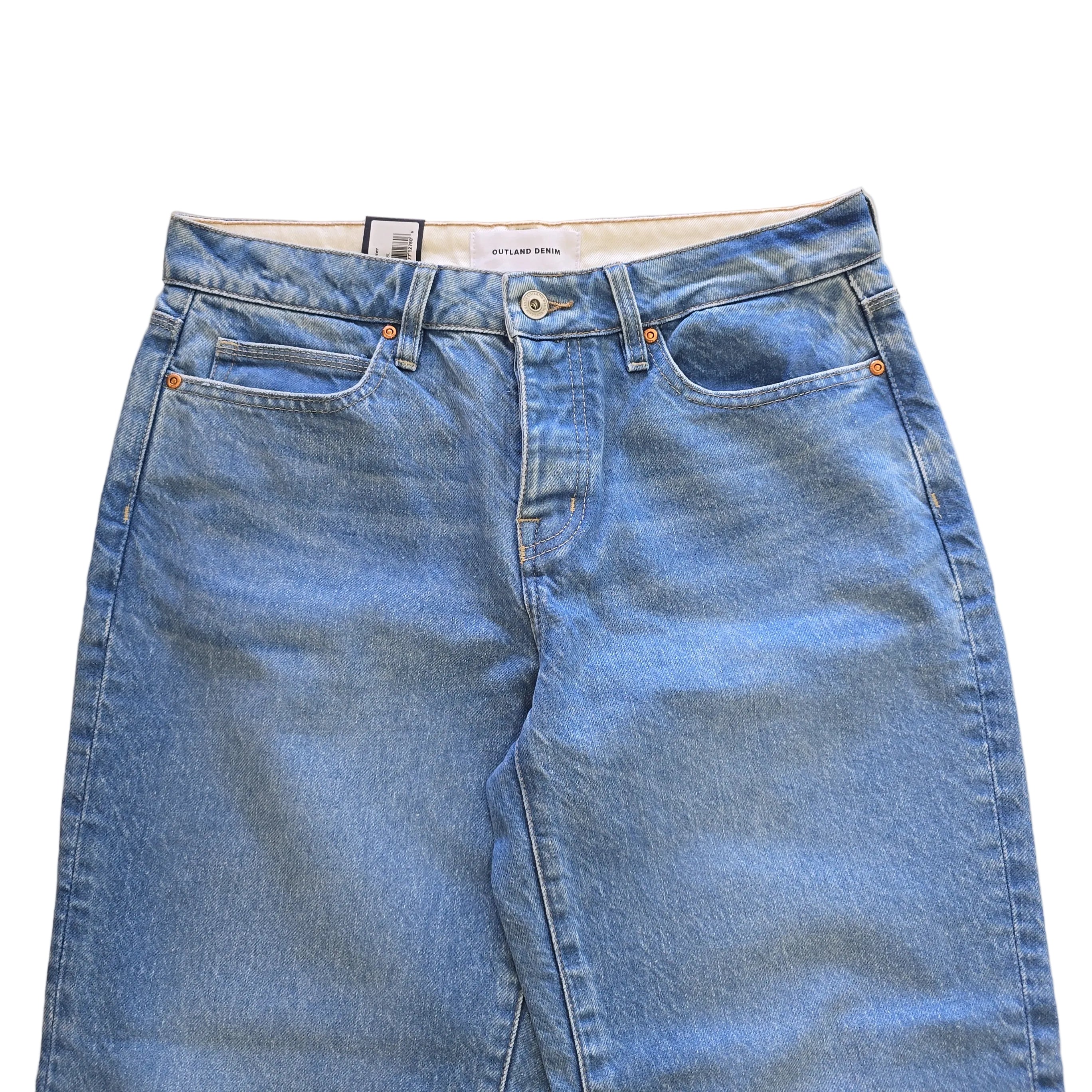 Pair of blue jeans on a light background