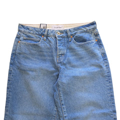 Pair of blue jeans on a light background