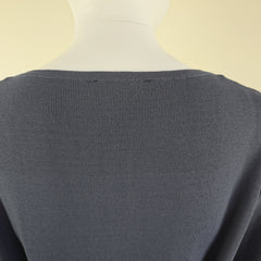 Close-up of a gray fabric texture on a light yellow background