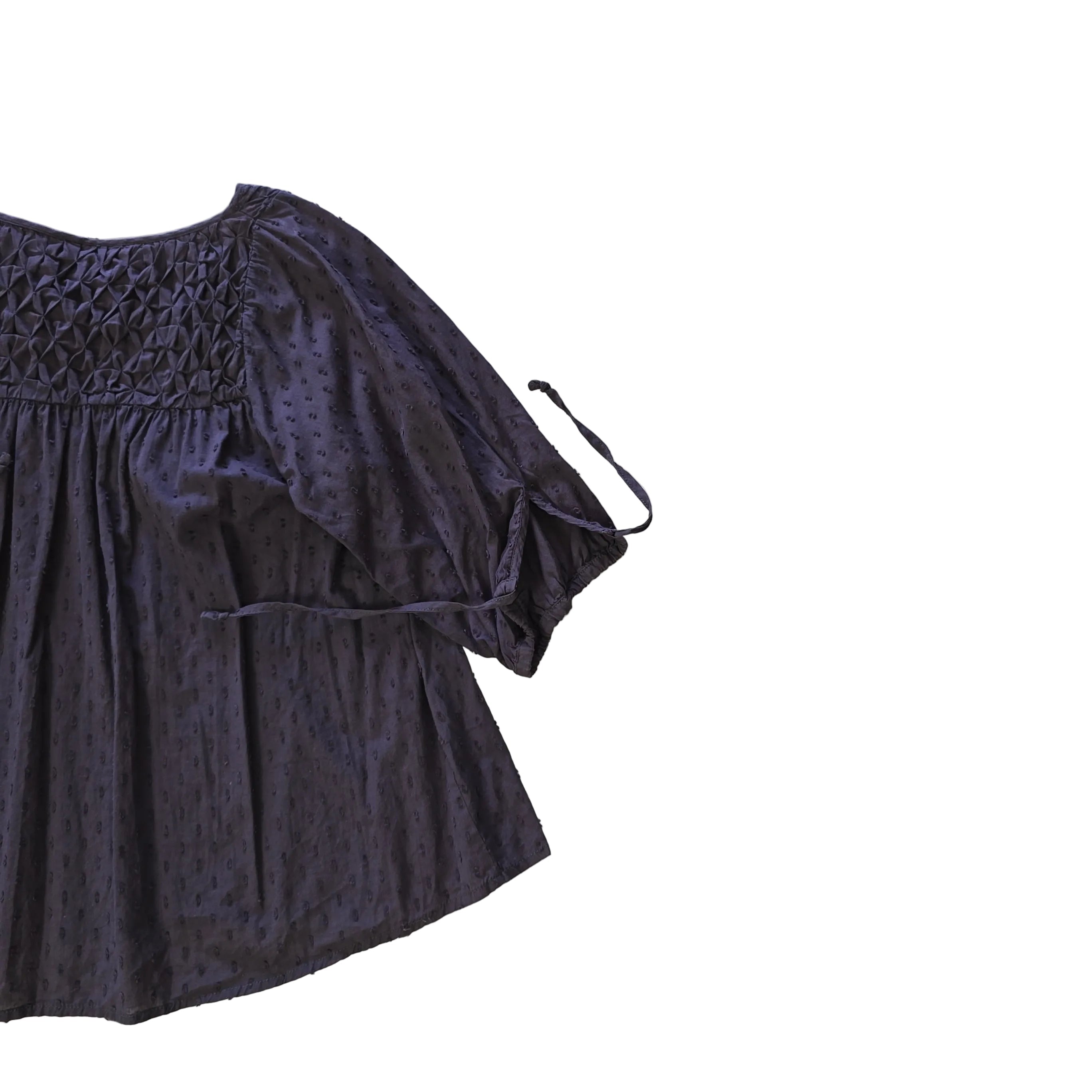 Brown long-sleeve top on a light background