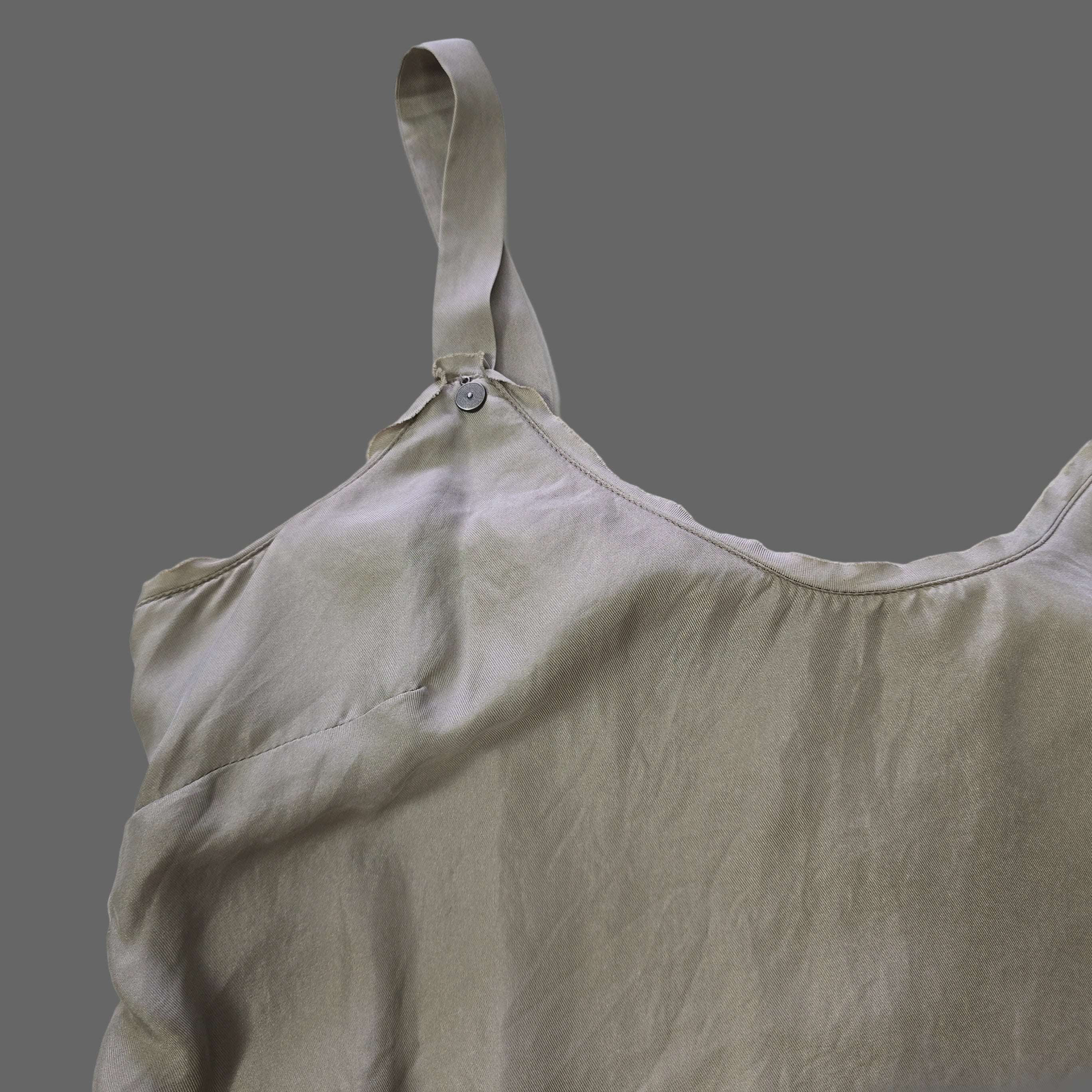 Light gray fitted top with a white tiled floor.