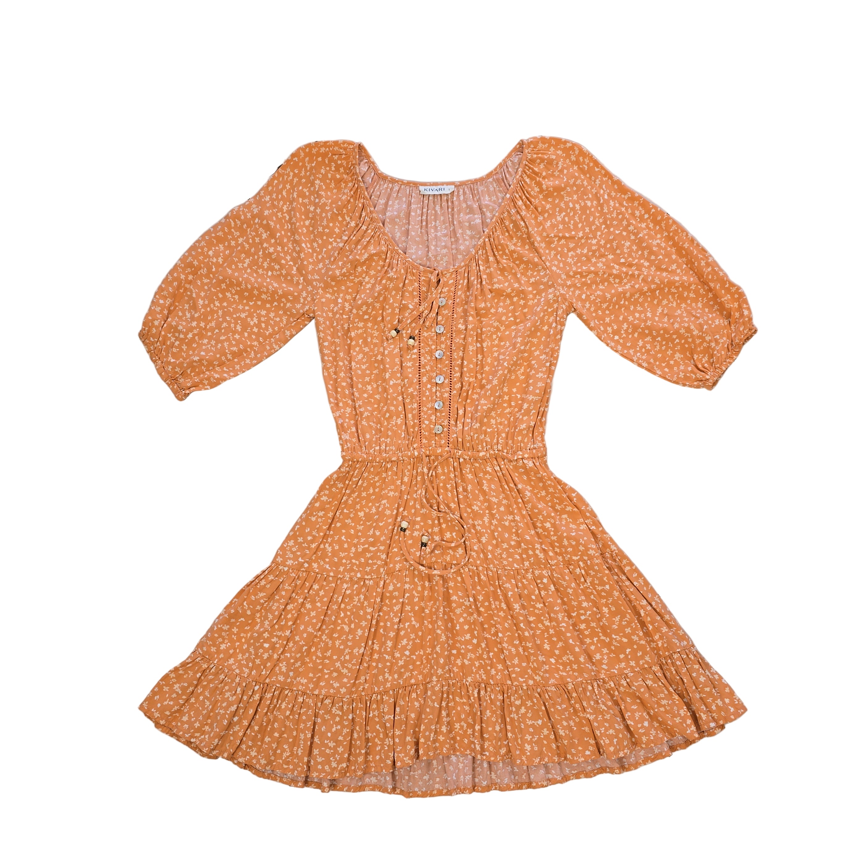 Orange floral dress on a light background