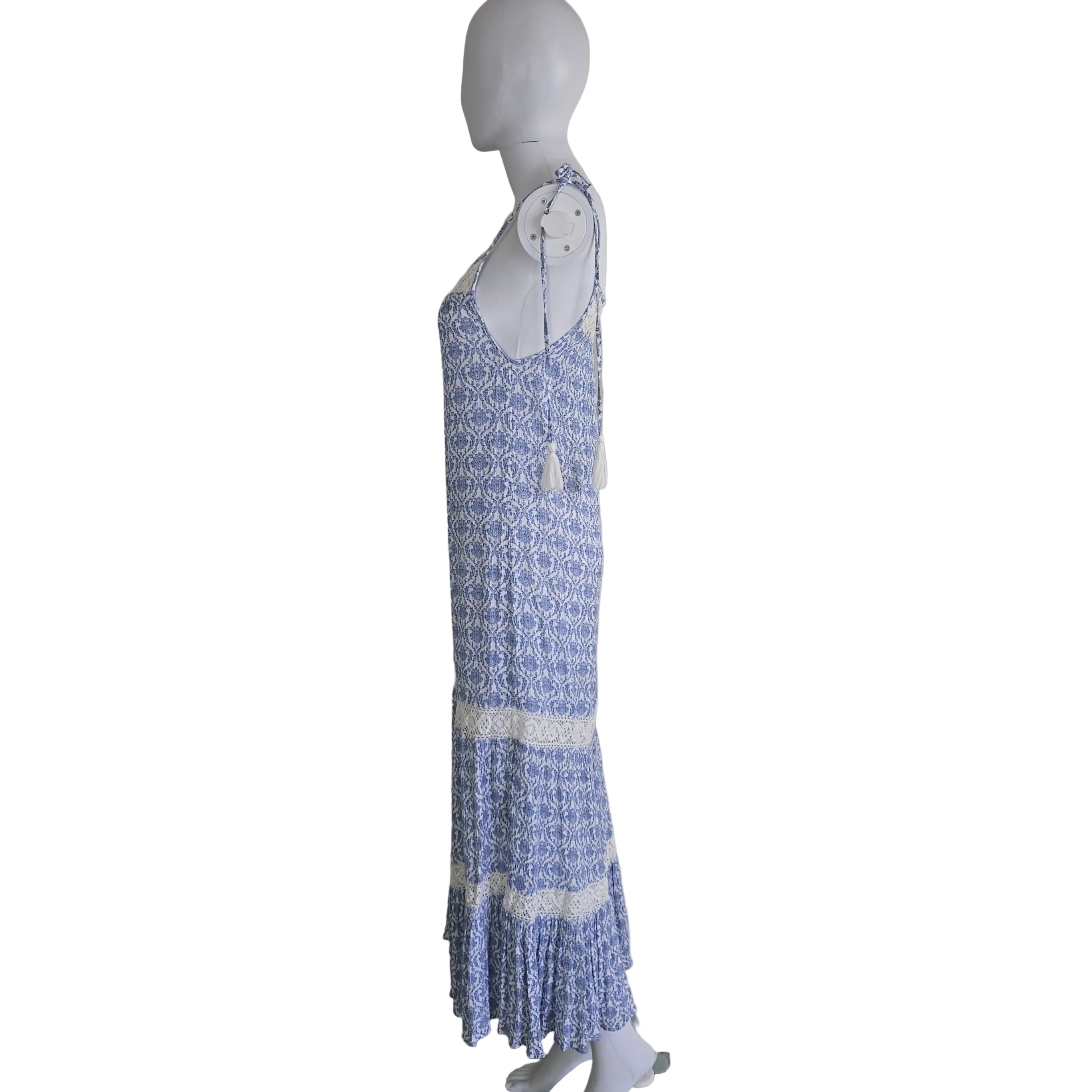 Blue and white patterned dress on a light background