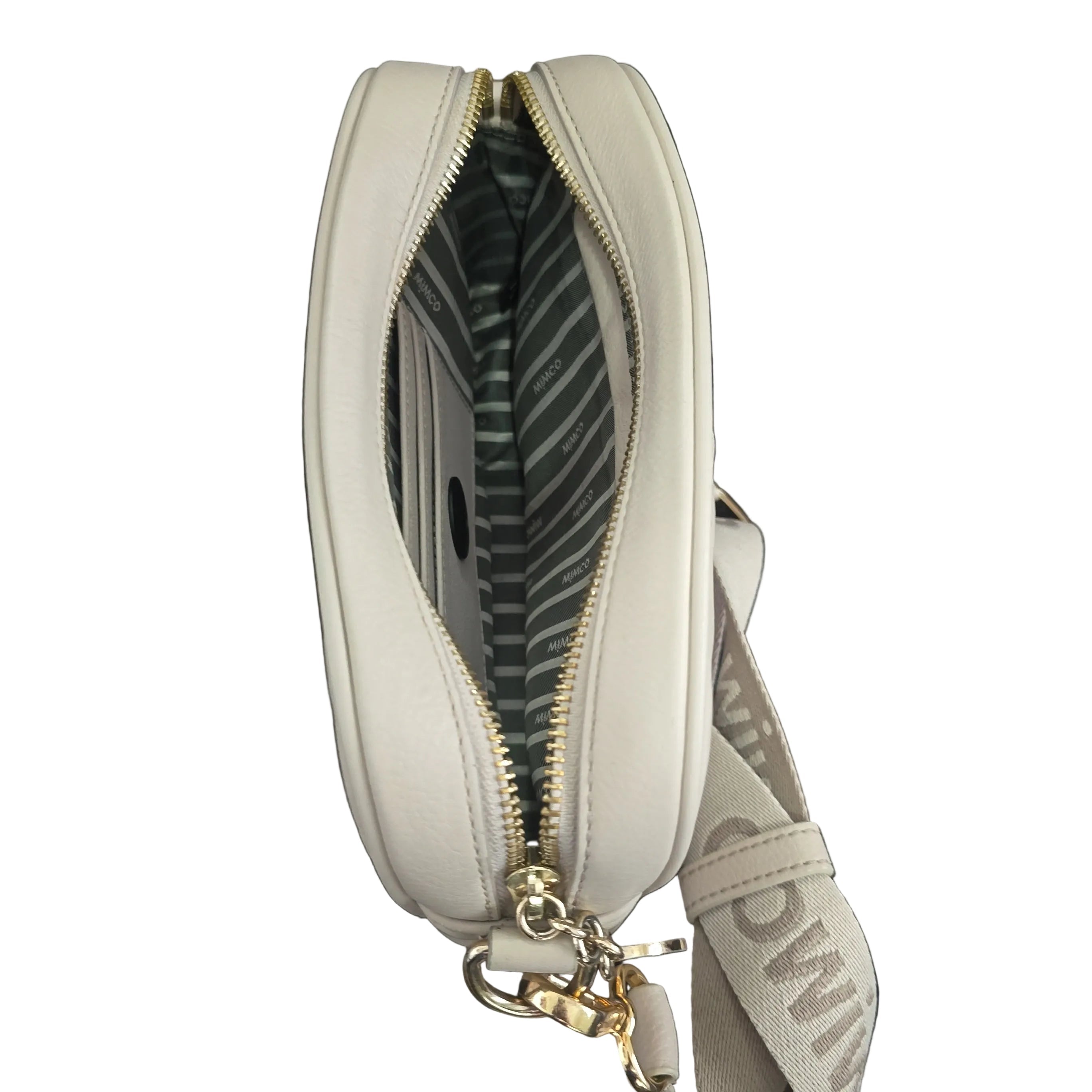 Grey handbag with gold zipper and patterned interior on a light background