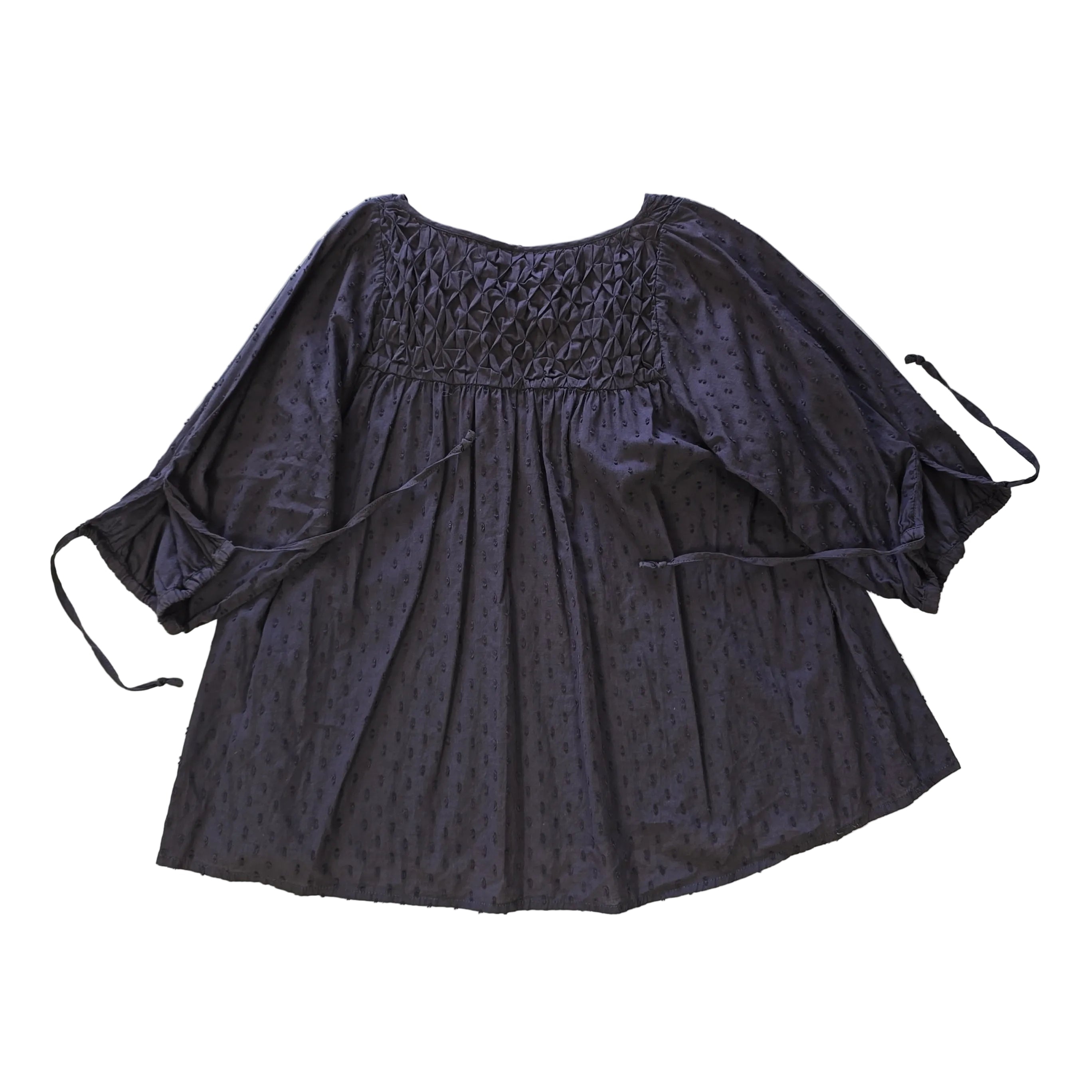 Brown long-sleeve top on a light background