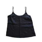 Black tank top on a light background