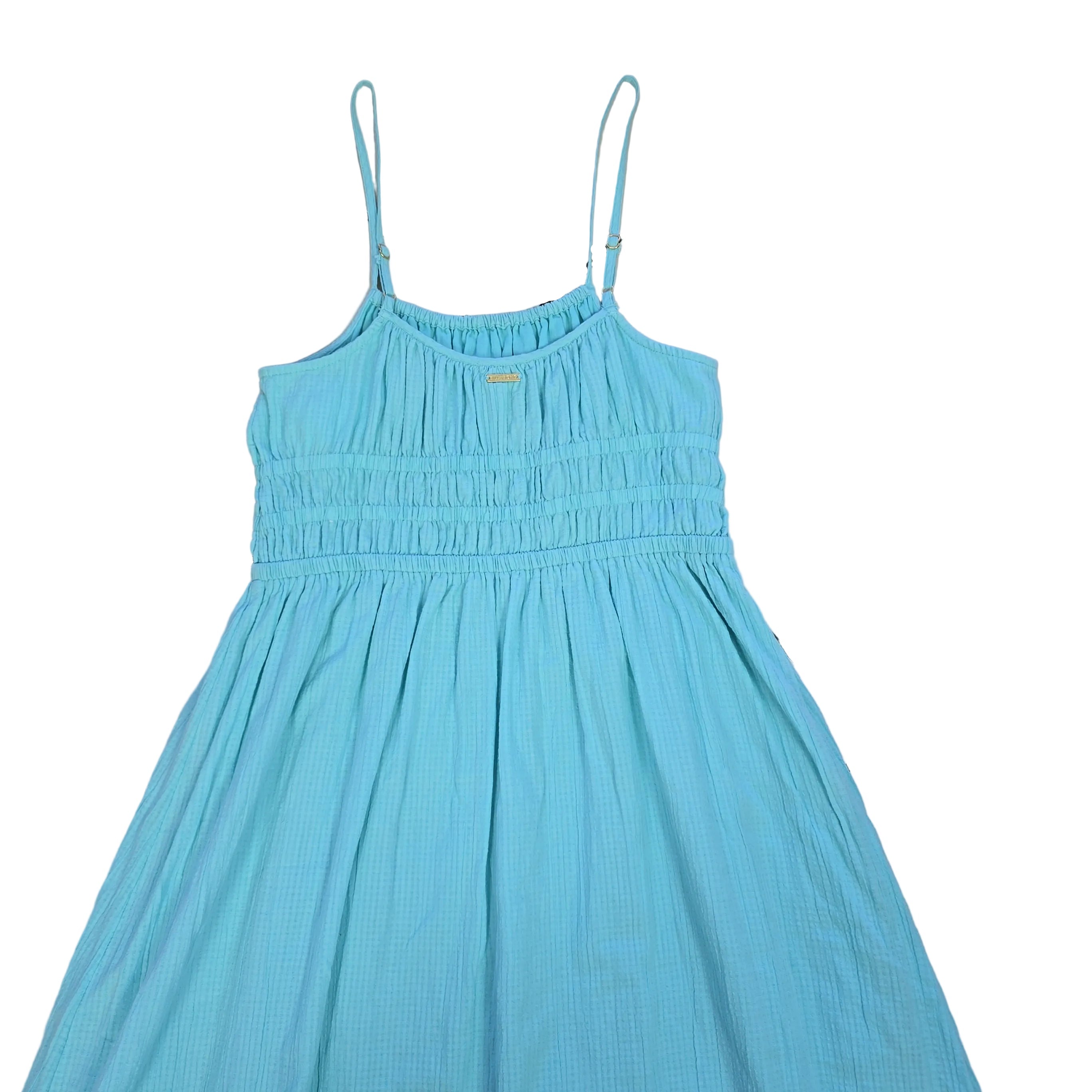 Light blue dress on a light background