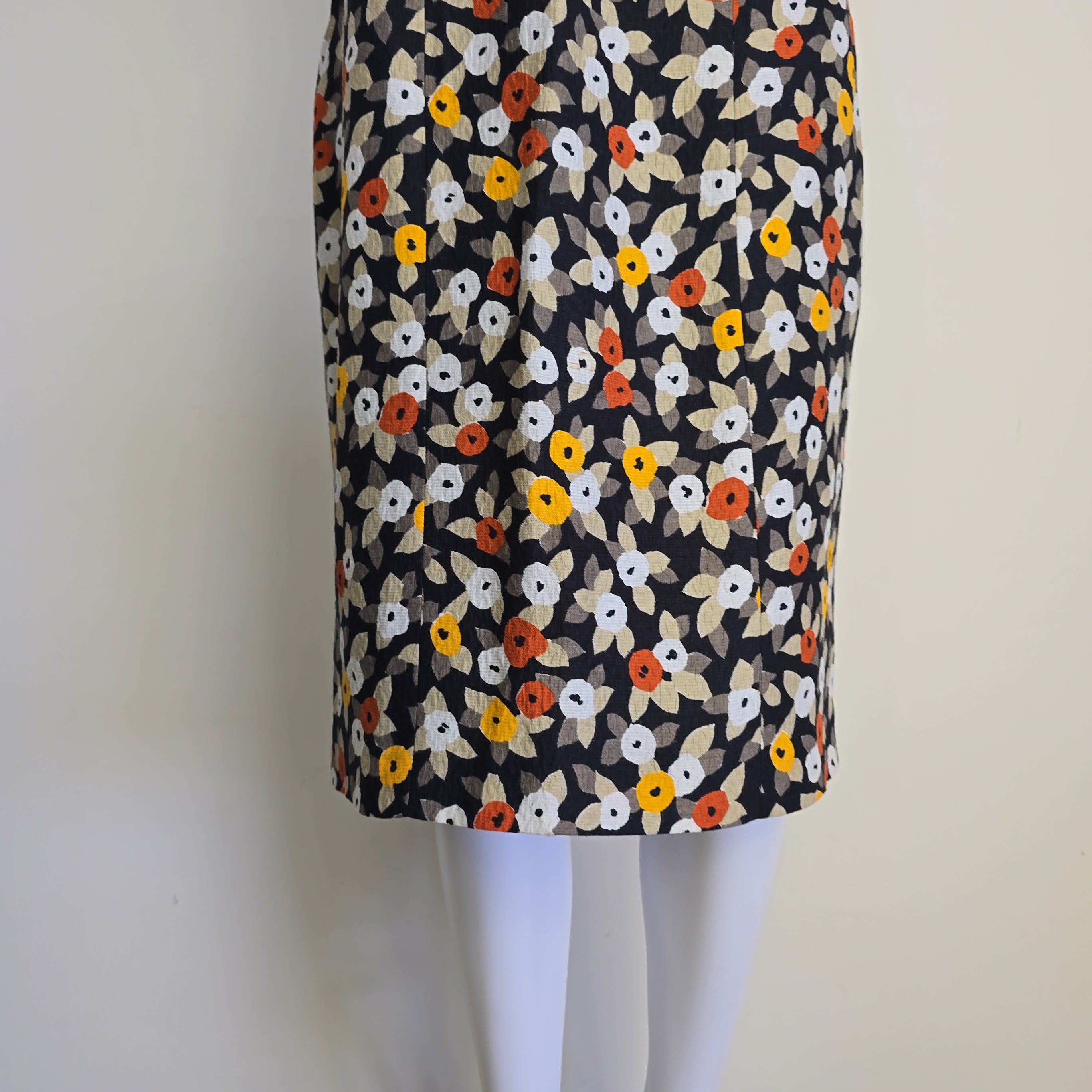 Floral-patterned strapless dress on a light background