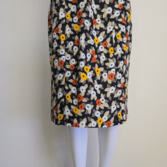 Floral-patterned strapless dress on a light background