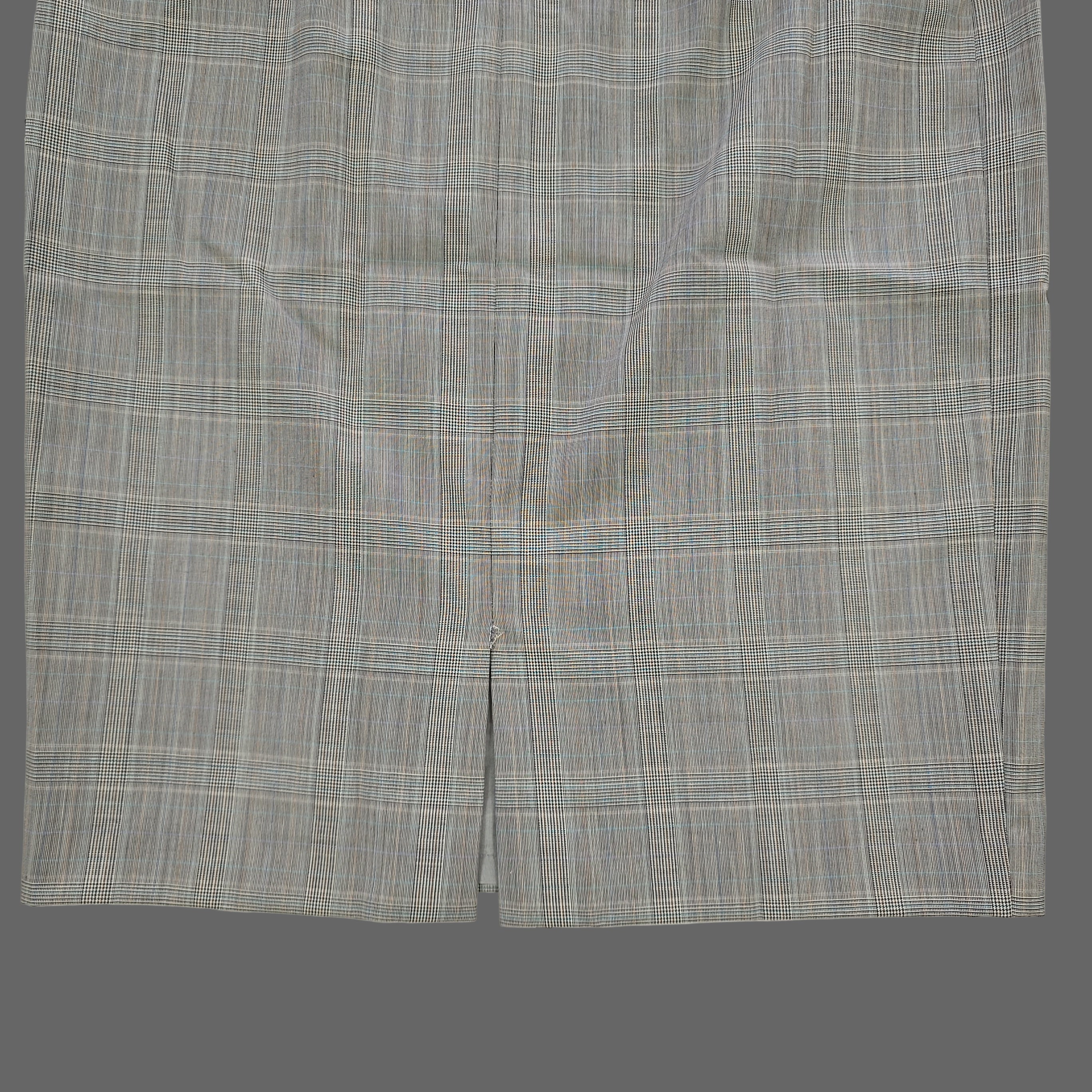 Gray checkered skirt on a tiled floor