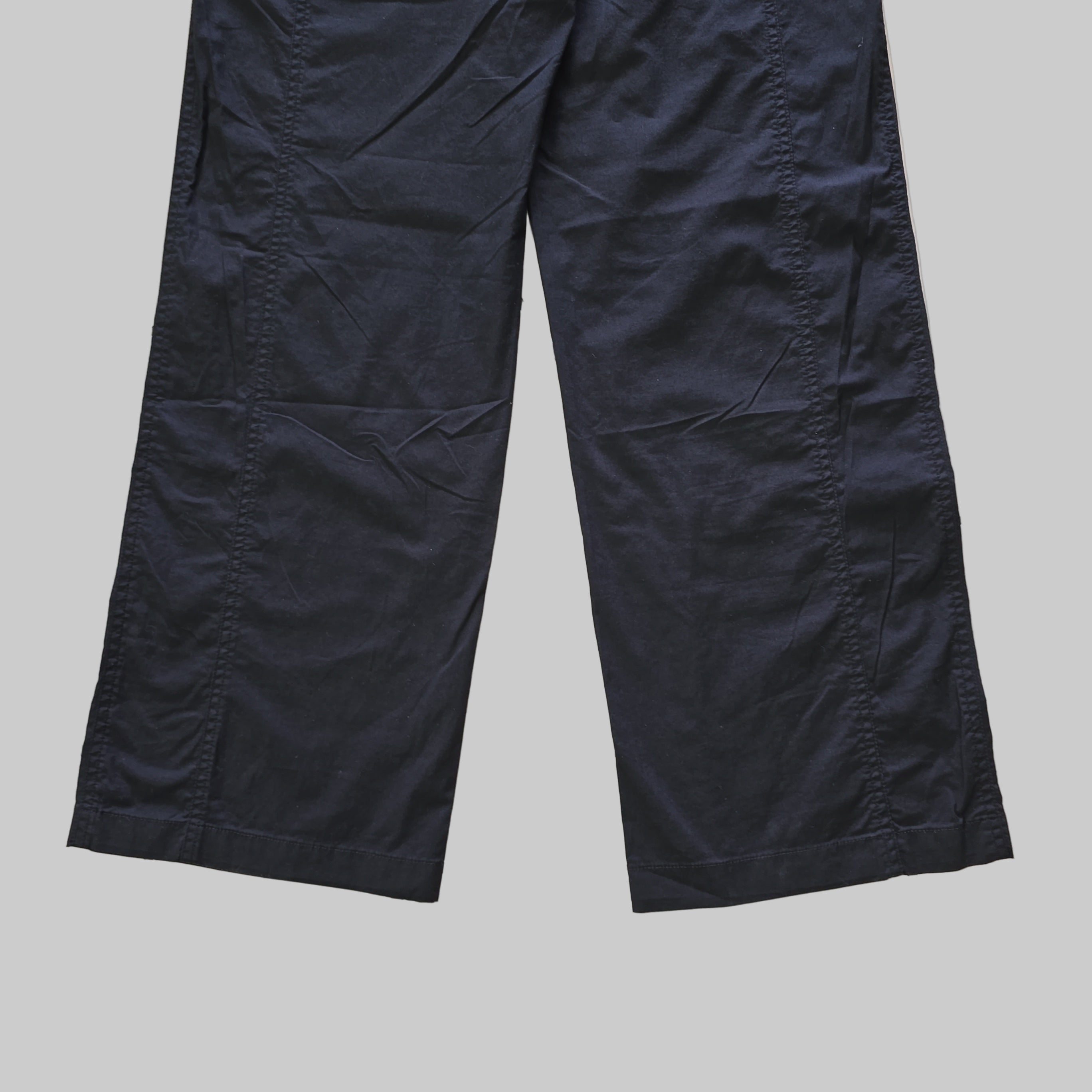 Pair of black pants on a light background