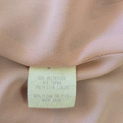 Close-up of a fabric tag on beige fabric