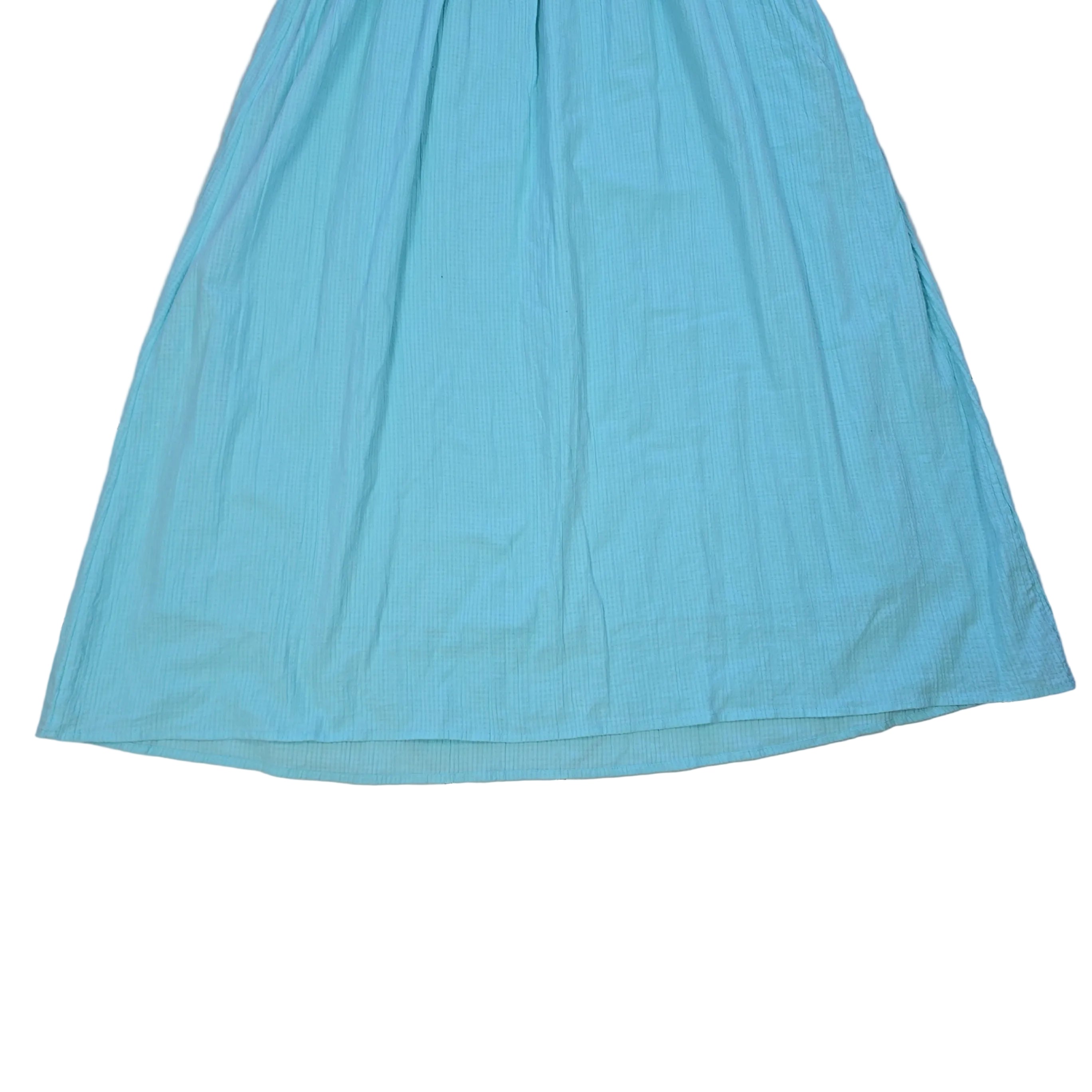 Light blue dress on a light background