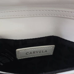 Close-up of a Carvela label on a product with a white background