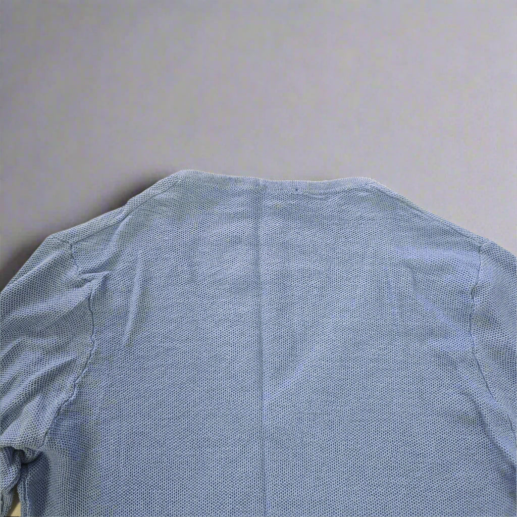 Blue fabric on a beige tiled floor