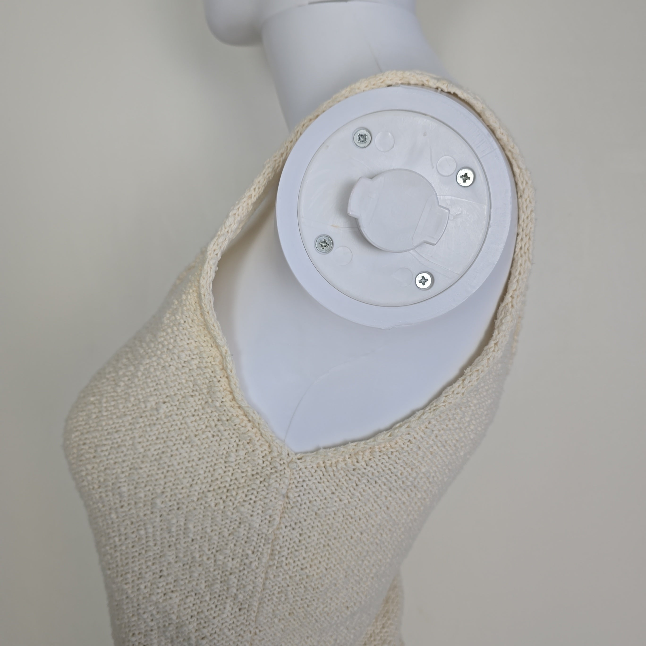 White knitted tank top on a light background