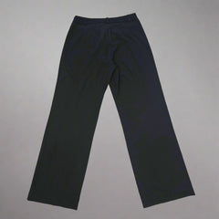 Black pants on a tiled floor