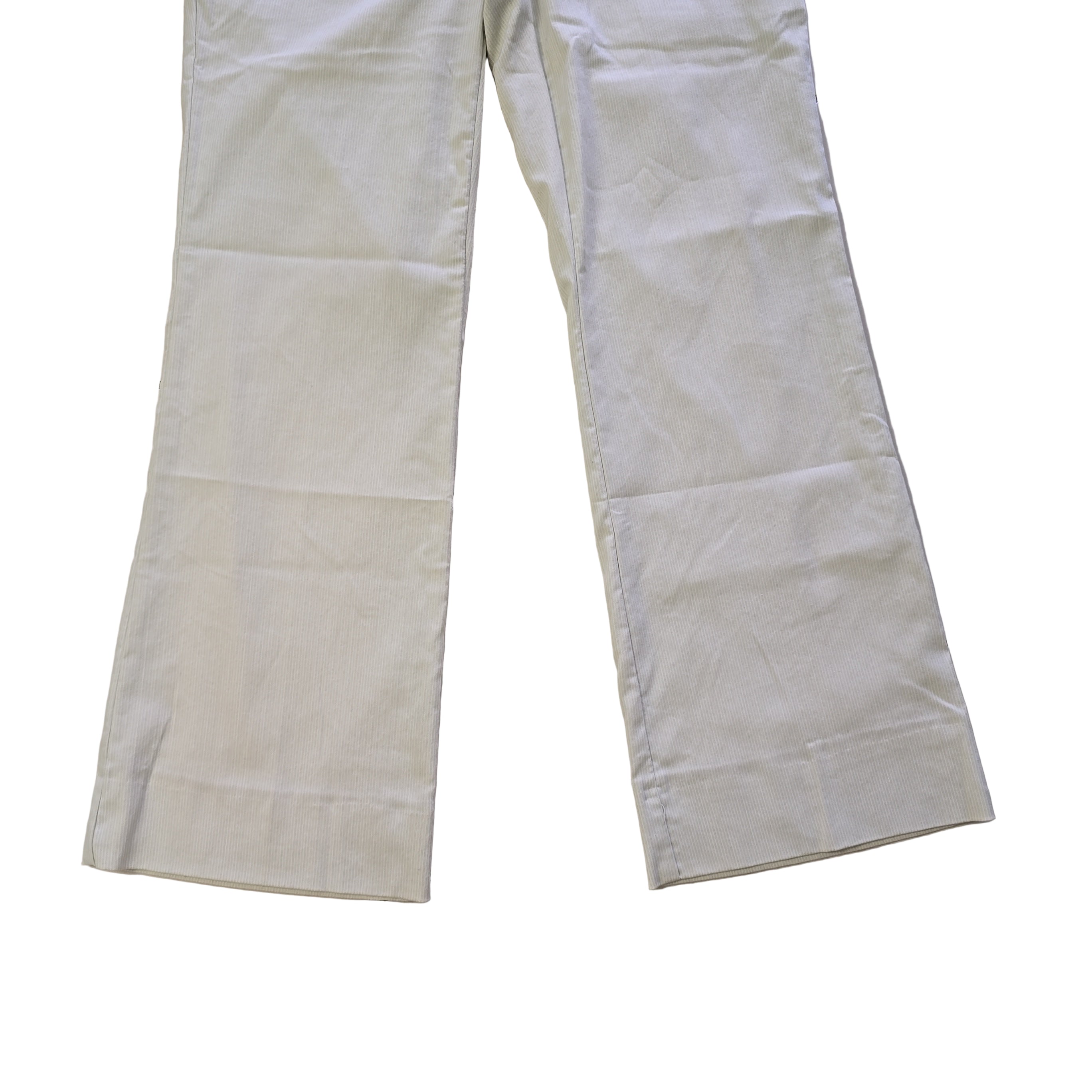 beige and white striped pants on a tiled floor