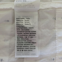 Text label on a textured fabric background